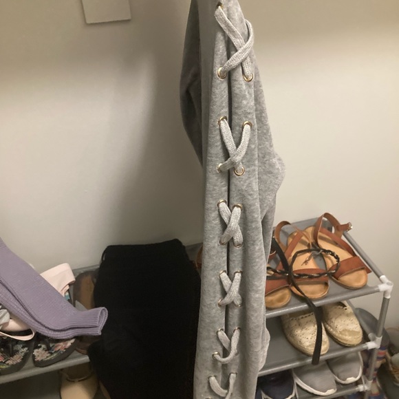 Grey crewneck top with crossover sleeve design - Picture 2 of 3